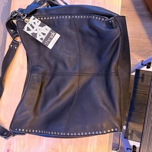 The Sak Black Leather